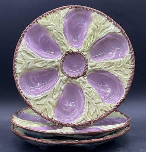 Lot 3 Vintage Hand Painted Majolica Oyster Plates: Vintage Hand Painted Majolica Oyster Plates featuring a seaweed and coral pattern. Pieces feature purple or blue hues alongside brown & light green hues. Measures approx. 9L x 9W in. Chipping, wear to