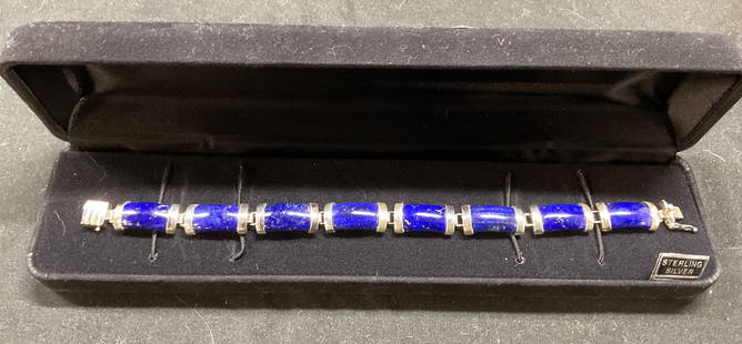 Signed HN Sterling Silver Lapis Lazuli Bracelet: Signed Sterling silver bracelet with lapis lazuli panels. Marked sterling. Signed HN. Measures approx 7 inches long. Total weight 16.9 grams. Includes jewelry box. Some wear including scratching obser