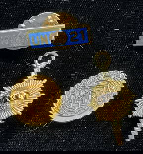 Lot 3 Gold Filled United Nations & College Pins: Lot of 3 vintage pins. Gold tone United Nations enamel pin. 1961 LGB 10k gold filled University of Miami deans lists academic honors pin. 1961 gold filled University of Miami Greek pin. Largest measur