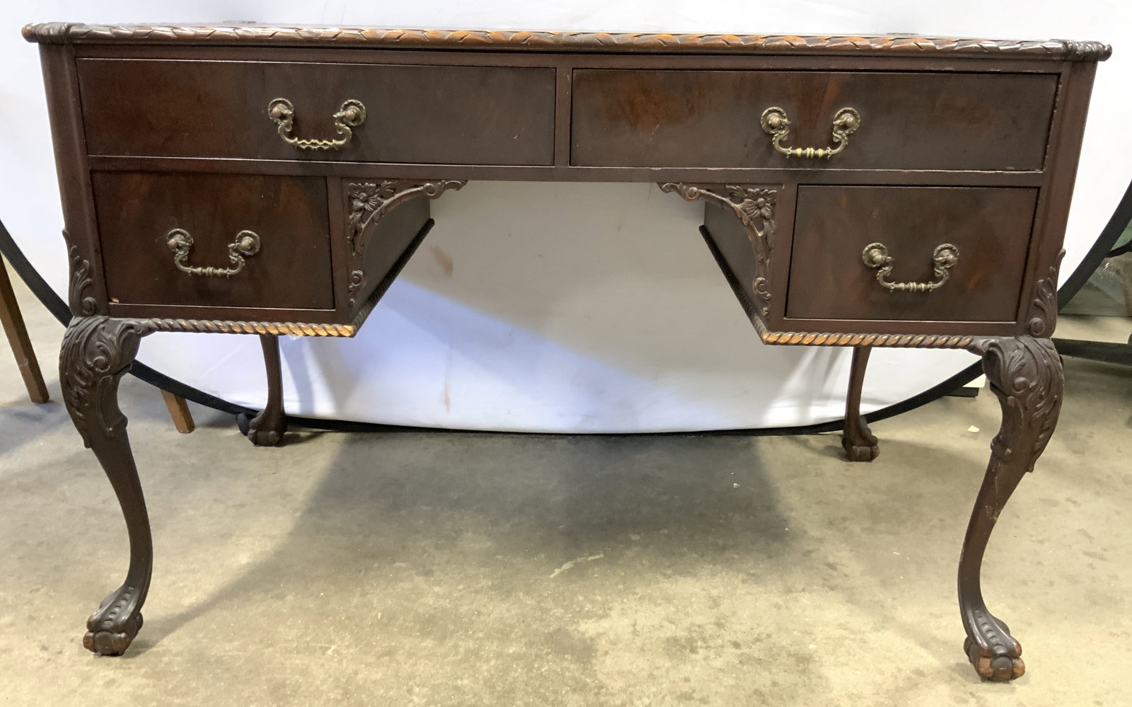 Atq Chippendale Ball & Claw Ft Crvd Wd Writing Dsk: Desk appears to be antique possibly vintage. Piece is dark brown toned and wooden. Chippendale style desk with ball and claw feet. Desk has 4 drawers. Each with brass handles and hand dovetailing. Mea