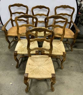 Set 6 Vtg French Provincial Wooden Dining Chrs: Lot includes 4 side chairs and 2 end chairs. Each piece is crafted from distressed wood. Chairs each have tan toned rush seats. Chair legs have stretchers in between. French provincial dining chairs E