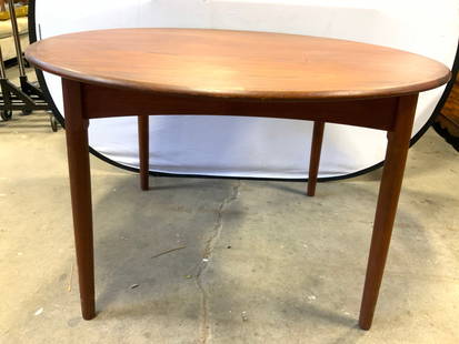 MOBELINTARSIA Danish Modern Wd Dining Tbl W Leaves: Underside reads DANISH MADE IN DENMARK. Table is tan toned and wooden. When table is closed, piece has circular form. Table includes 2 leaf extensions. Danish modern dining table. Table measures appro