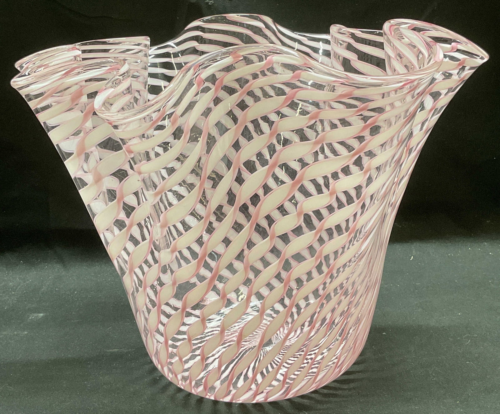 Murano Latticino Handkerchief Art Glass Vase: MURANO Art glass vase. Latticino pattern in pink and white on clear glass. Handkerchief rim. Hand blown glass. Measures approx 12 x 9 inches. Some wear including scratching observed. MURANO vase, Latt