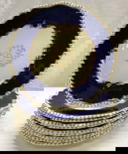 10 ROYAL WORCESTER Pillament Cobalt Plates ENGLAND: 10 ROYAL WORCESTER Pillament Cobalt Plates ENGLAND Plates are made of bone china with a cobalt blue rim & gilt accents. Plates feature a gilt oriental scene in the center. Signed & marked on underside