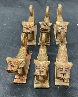 Set 6 Vtg African Benin Bronze Leopard Sculptures: Set 6 vintage African Benin bronze leopard sculptures. Hand made bronze sculpture paper weights. Abstract leopard pattern. 3 x 1 inches. Discoloration, rusting present. Leopard sculptures, sculptures,