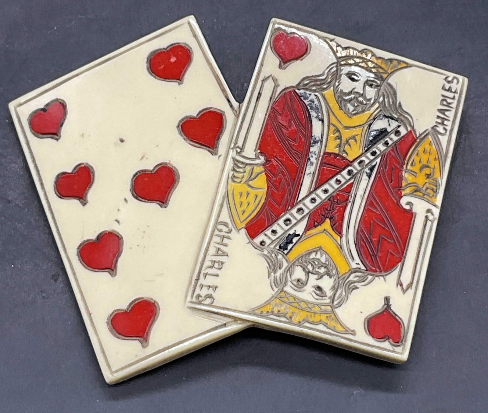 CHARLES Vtg Hand Painted Playing Card Belt Buckle: CHARLES Vintage Hand Painted Playing Card Belt Buckle. The piece is crafted from a resinous material and features an etched playing card motif. The King of Hearts is depicted. The word CHARLES appears