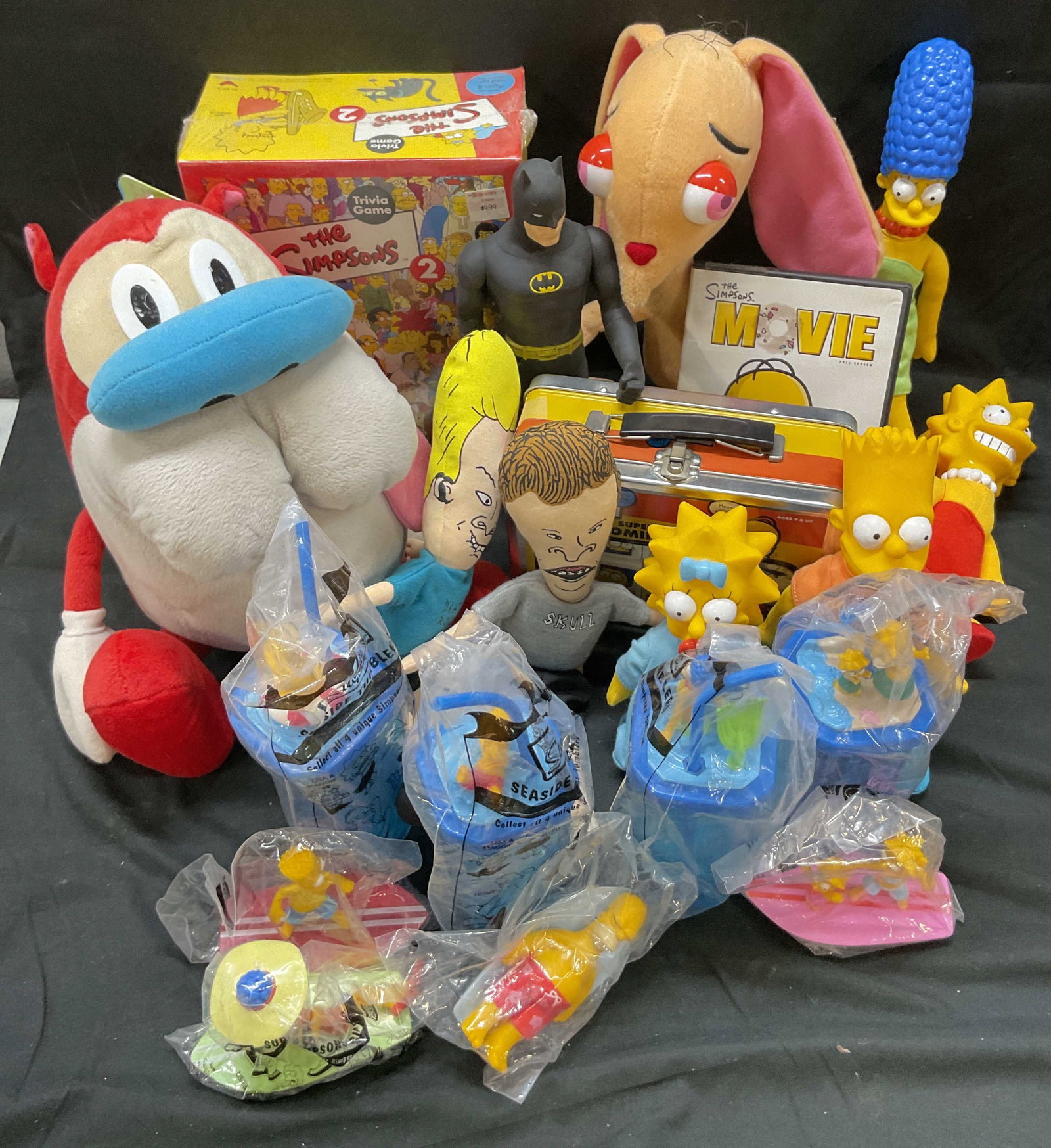 Group lot 20 Y2K Collectible Cartoon Toys: Group lot 20 Y2K Collectible cartoon toys. Lot includes 8 McDonalds happy meal toys, 1 Batman figurine, 4 Simpsons figurines, 1 Simpsons 2 trivia game NIP, 1 Simpsons dominos in lunchbox NIP, 2 Stimpy