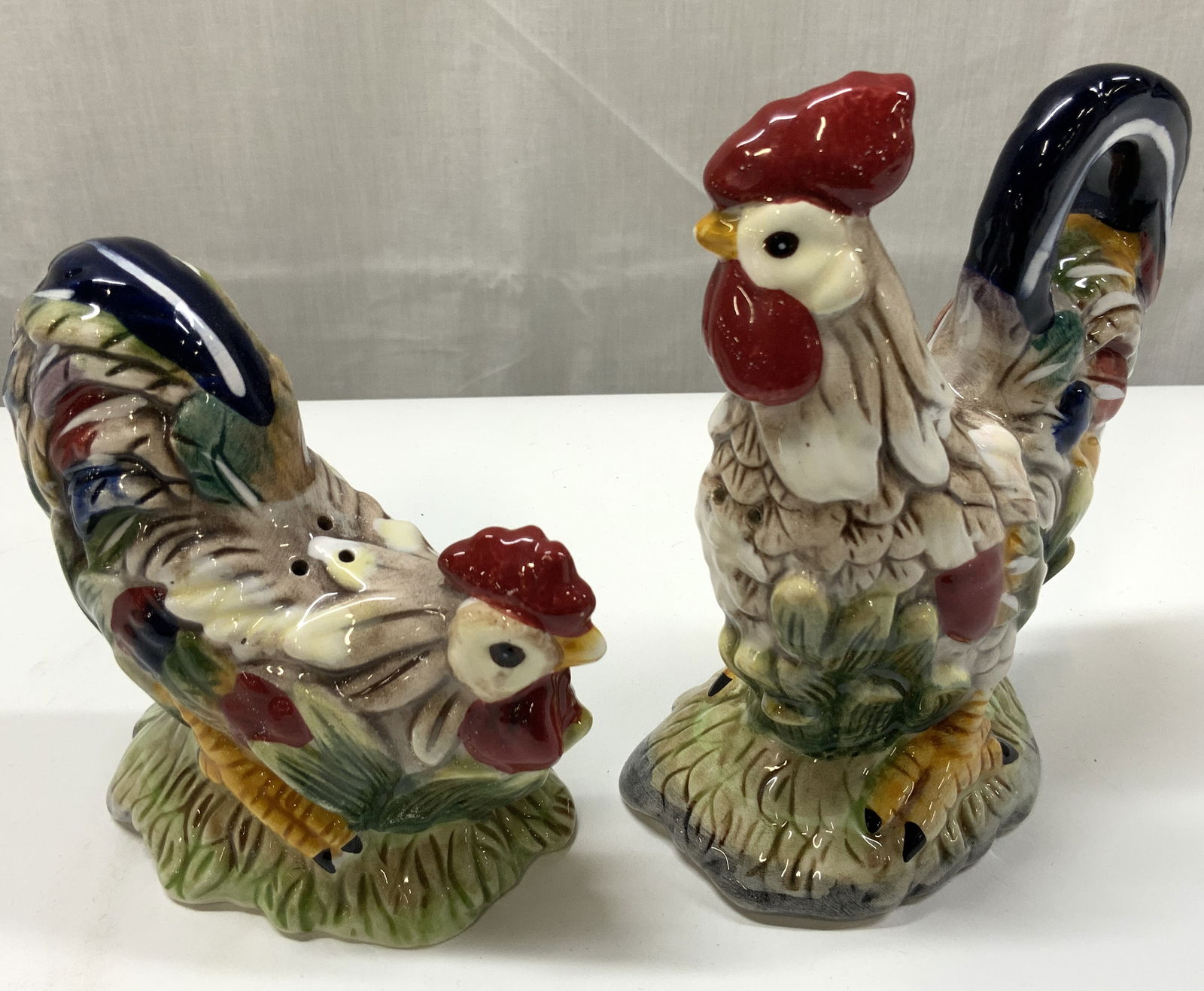 J. WILLFRED Sadek Rooster & Chicken S&P Shakers: J. WILLFRED Sadek Rooster & Chicken S&P Shakers Salt & pepper shakers depicting a rooster & chicken. They have intricate details & vibrant colors. Appears to be J.WILLFRED SADEK, no visible signature