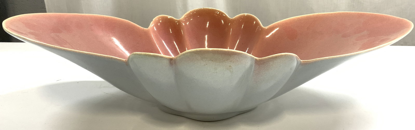 MCM Resin Shell Form Bowl Pink Blue: Bowl has shell form. piece is mid century modern. Bowl has pink interior with light blue toned exterior. Vessel is porcelain style, appears to be resin/composite. Center of sides are Scalloped. Bowl m