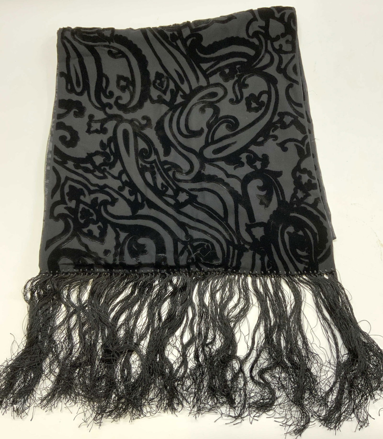 Black Silk & Viscose Damask Fringe Scarf ITALY: Black Silk & Viscose Damask Fringe Scarf ITALY Scarf has black fringes & appears to have a floral & swirls motif pattern. Tag reads 50% Silk & 50% Viscose. Made in ITALY. No other visible signature or