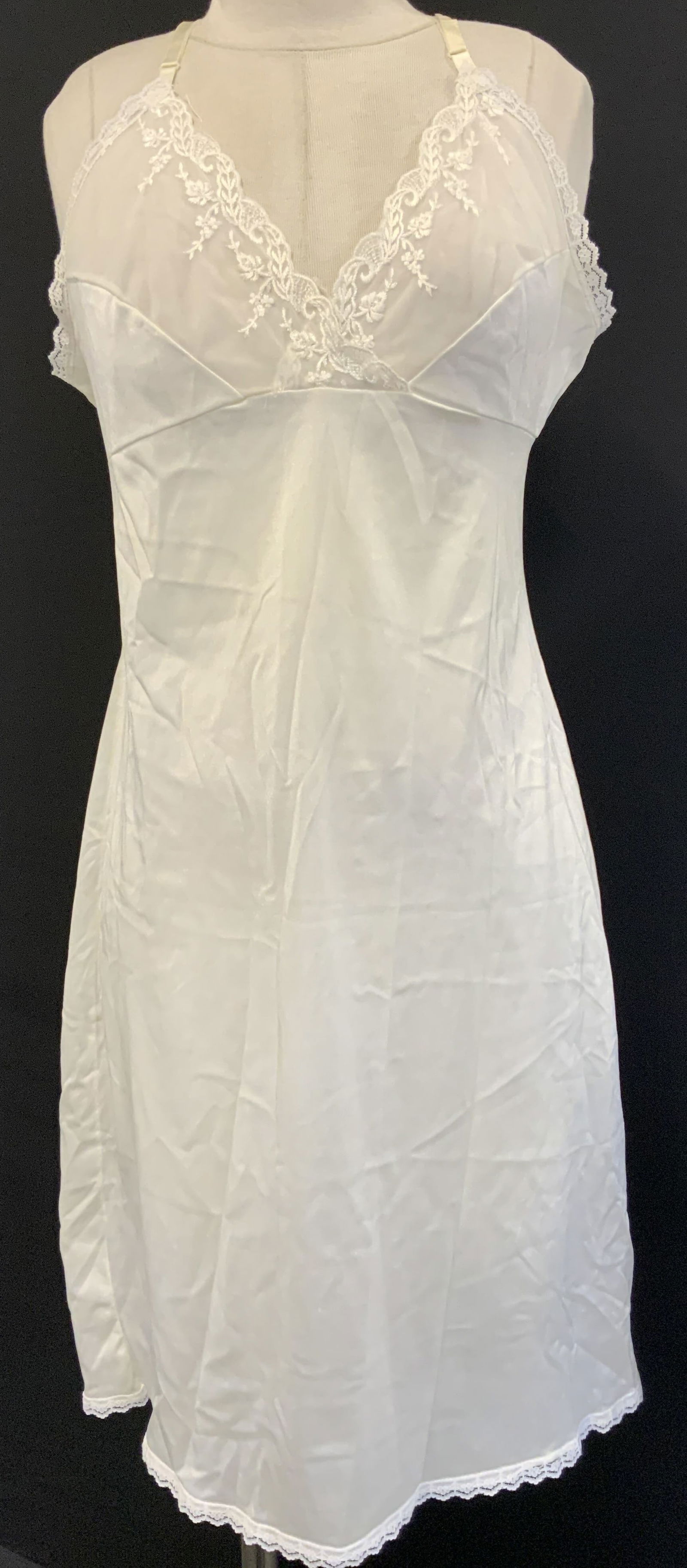 SIGNED Delicate Cream Night Gown W Lace Accents: SIGNED Delicate Cream Night Gown W Lace Accents Cream night gown has lace detailing on the bust & bottom ends. Night gown has adjustable straps. Gown has visible tag, but not legible. Surface wear con