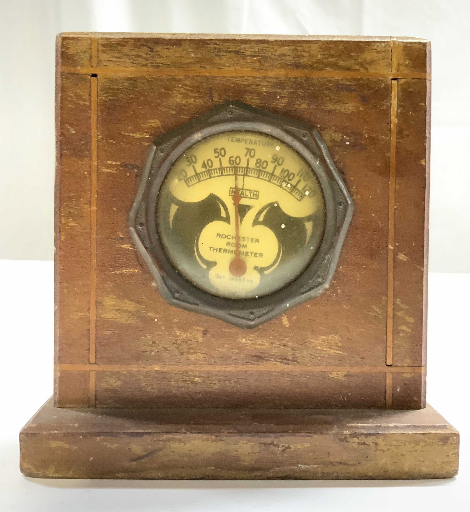 ROCHESTER Vntg Wooden Room Thermometer: Face reads ROCHESTER ROOM THERMOMETER. Piece is light brown toned and wooden. Room Thermometer is vintage. Piece measures approximately 4.5 inches tall 4.25 inches wide 1.5 inches deep. Room thermomet