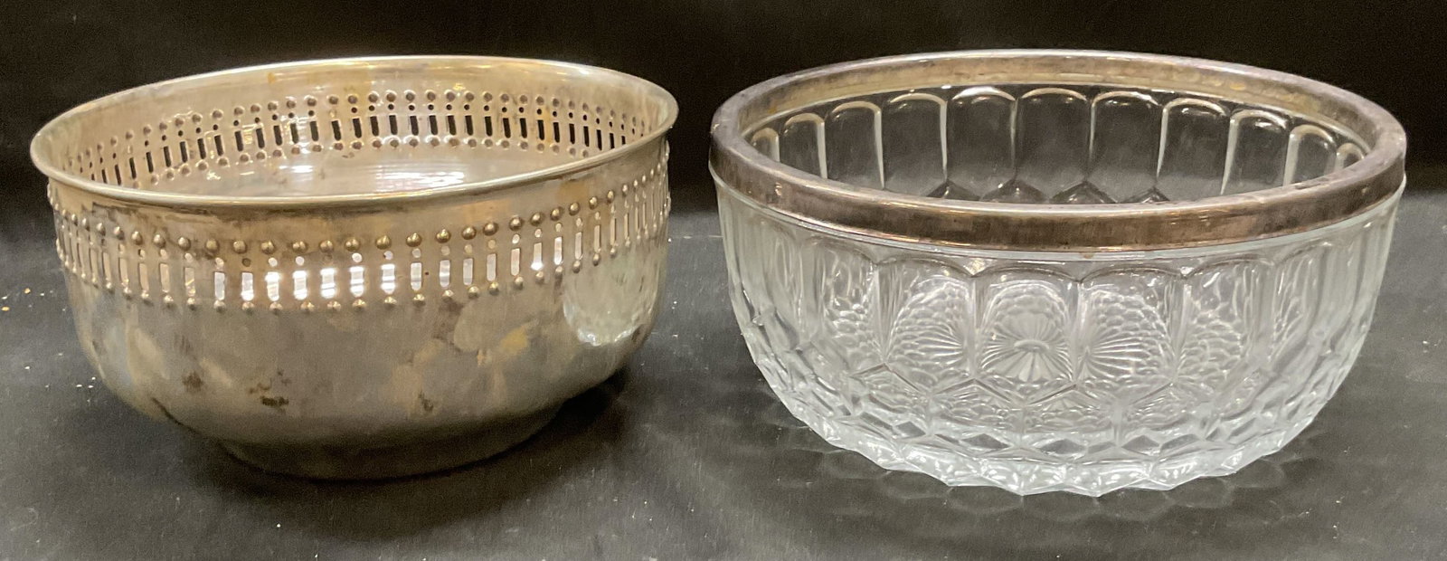 Lot 2 Vtg Silver Plated & Glass Bowls: Lot of 2 Vintage bowls. Silver plated bowl with pierced rim and geometric pattern glass bowl with silver plated rim. Larger bowl measures approx 8.75 x 4 inches. Some wear to each including scratching