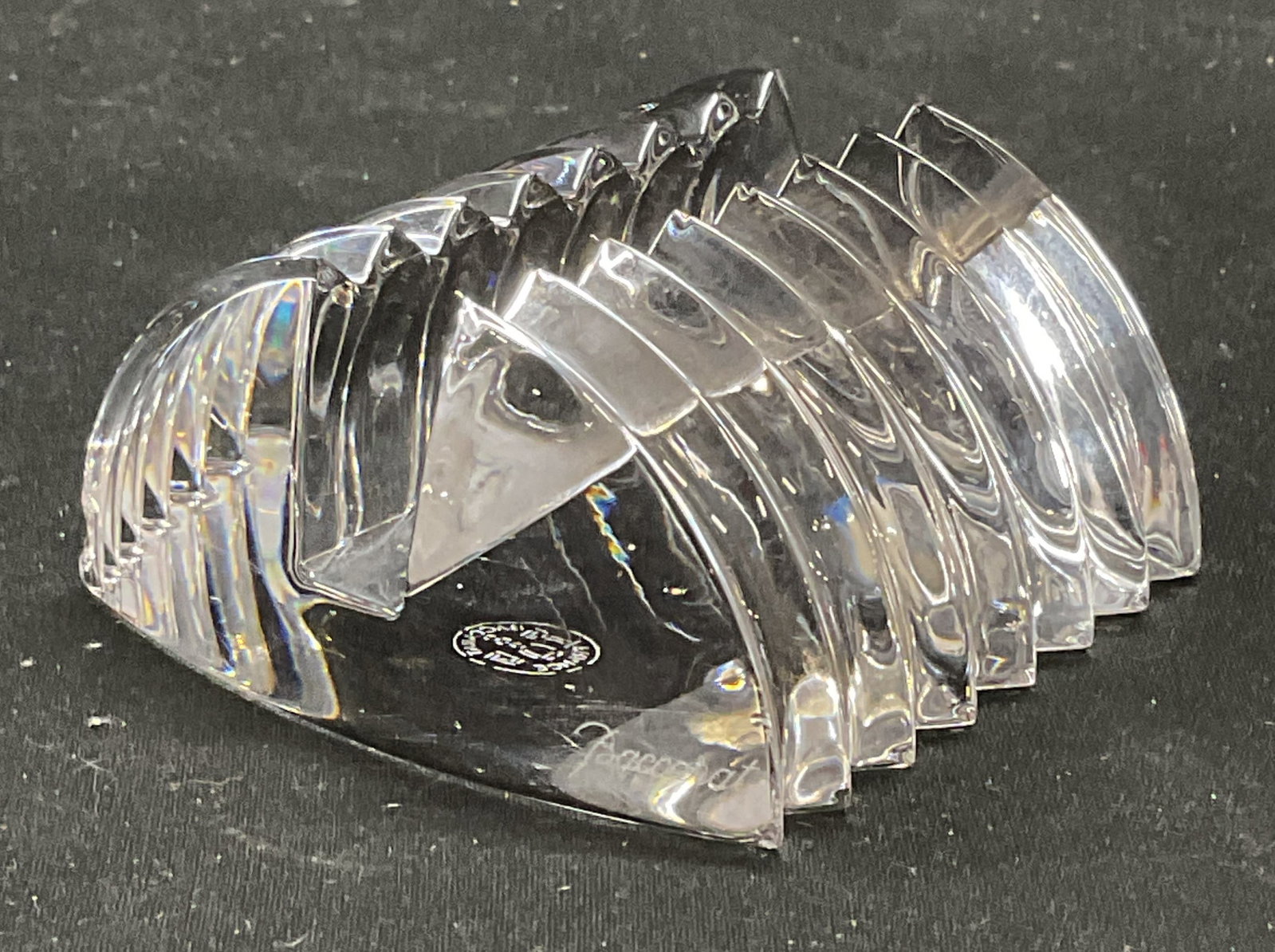 Baccarat Vega Cut Crystal Photo Stand, France: Baccarat cut crystal photo stand. Vega pattern. Ripped design. Signed on underside. Made in France. Measures approx 2.5 x 2.75 x 1 3/8 inches. Some scratching and small chips. Baccarat, baccarat Vega,