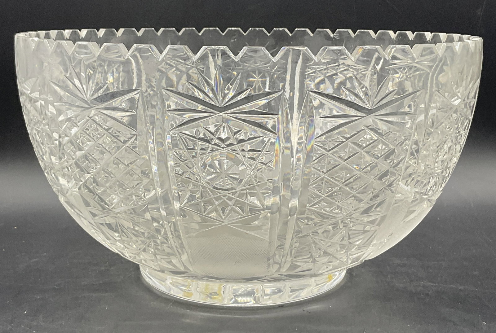 Vintage Cut Crystal Saw Tooth Rim Punch Bowl: Vintage Cut Crystal Saw Tooth Rim Punch Bowl. Thick walled and weighty clear crystal. Measures approx. 6.5H x 11.75W in. Discoloration, chipping, residue, and surface wear present. home decor, home ac
