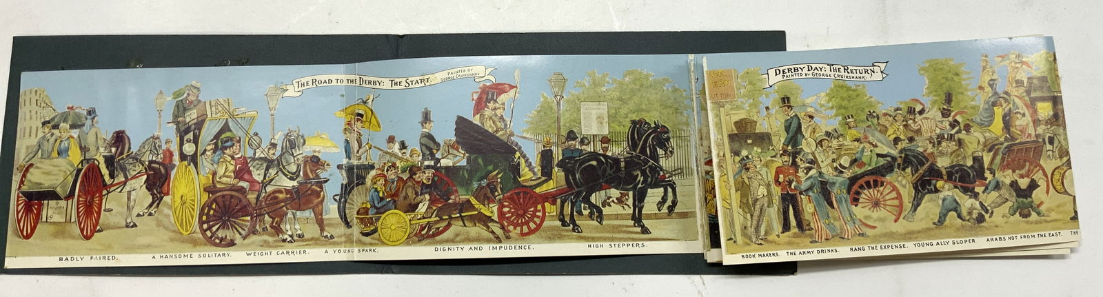 Road to Derby Panorama Book CRUIKSHANK England: The Road to the Derby Panorama Book CRUIKSHANK 6 foot panorama in colour. Book by George Cruikshank & published in ENGLAND BY SOLARBEST LIMITED. Book has colorful illustrations of figures. Surface wea