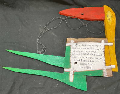 2005 Brian Andreas StoryPeople Art Wood Sculpture: 2005 Brian Andreas StoryPeople art wood sculpture. 2 pieces. Text says I spent a long time trying to find my center until I looked closely at it one night & found it had wheels & moved easily in the s