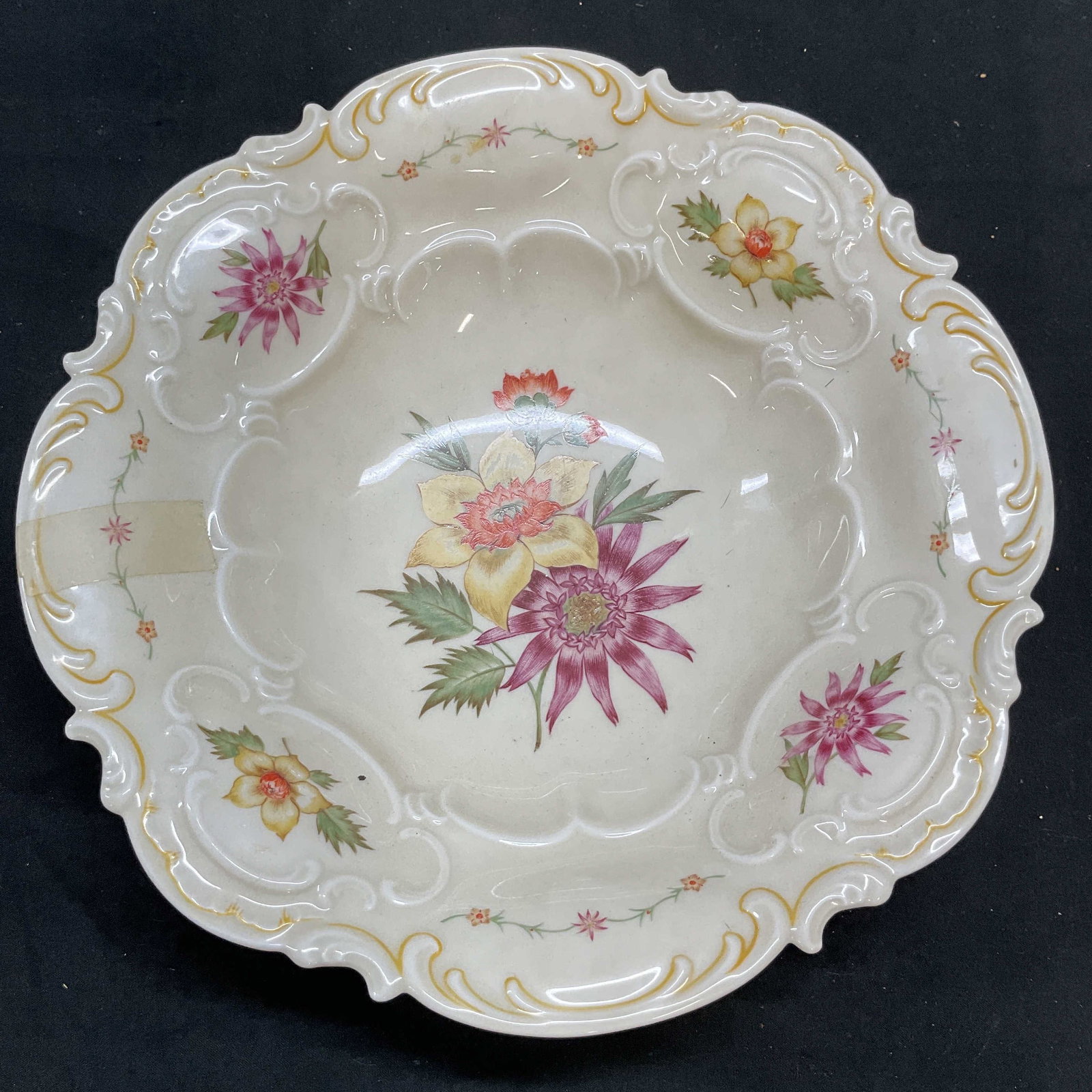 Vtg HUTSCHENREUTHER Floral Porcelain Bowl, Germany: Vintage HUTSCHENREUTHER porcelain bowl. Floral pattern with scalloped rim. Signed. Made in Germany. Measures approx 10 x 2.5 inches. Some scratching and crazing observed. Chip to base. HUTSCHENREUTHER