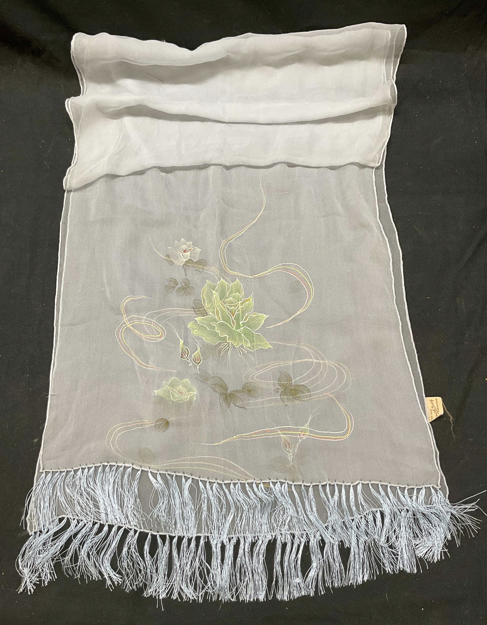 Vtg Maruichi Scarf Light Blue Silk Floral Japan: Vintage Maruichi Scarf blue silk floral. Light blue scarf with lotus flower embroidered pattern. Fringe details along edge. Pure silk. Made in Japan. 16.5 inches wide. Some surface wear consistent wit