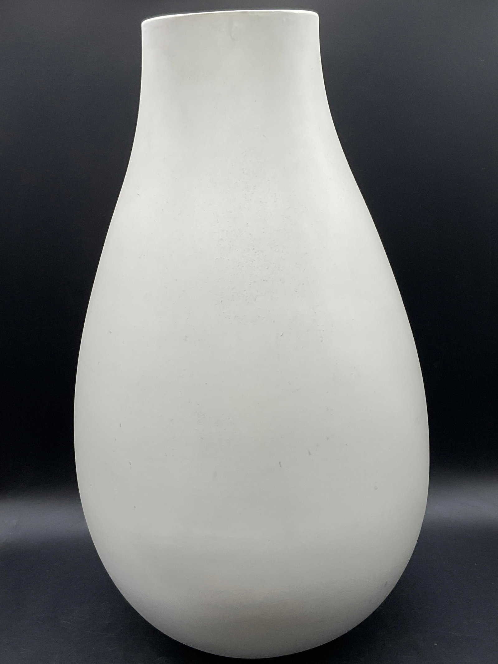 Minimalist White Pottery Vase, 21 Inch Ht: Minimalist White Pottery Vase. Weighty. Measures approx. 21H x 10W in. Measured at widest point. Discoloration, surface wear, pitting, and residue present. home decor, home accents, homewares, housewa
