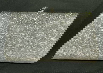 Silver Tone Metallic Sparkle Evening Handbag: Silver tone metallic sparkle evening handbag/clutch. Synthetic material. Measures approx 9 x 5 inches. Some wear consistent with exposure. Handbag, evening bag, sparkle handbag, silver tone handbag, a