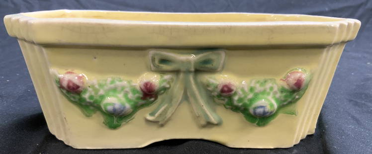 Vintage Ceramic Planter Vessel Yellow JAPAN: Planter is yellow toned and ceramic. Piece has multi toned floral, leaf and ribbon detail. Outer rim has lip. Scalloping to corners. Piece measures approximately 6.5 inches long 4.5 inches deep 2.5 in