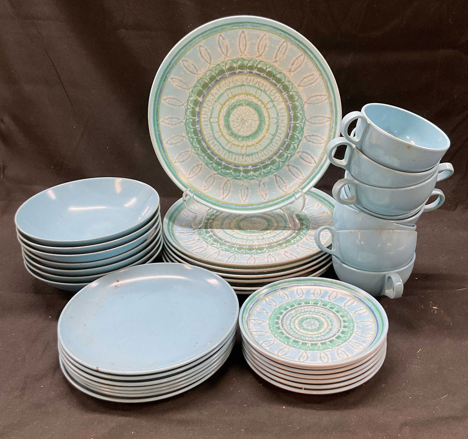 Lot 36 MCM Aquamarine Patterned Dishware: Lot of 36 mid century modern aquamarine patterned plates cups dishware. Lot includes 7 salad plates, 7 soup bowls, 8 cups, 7 saucers, 7 dinner plates. Solid aquamarine color design and blue and green