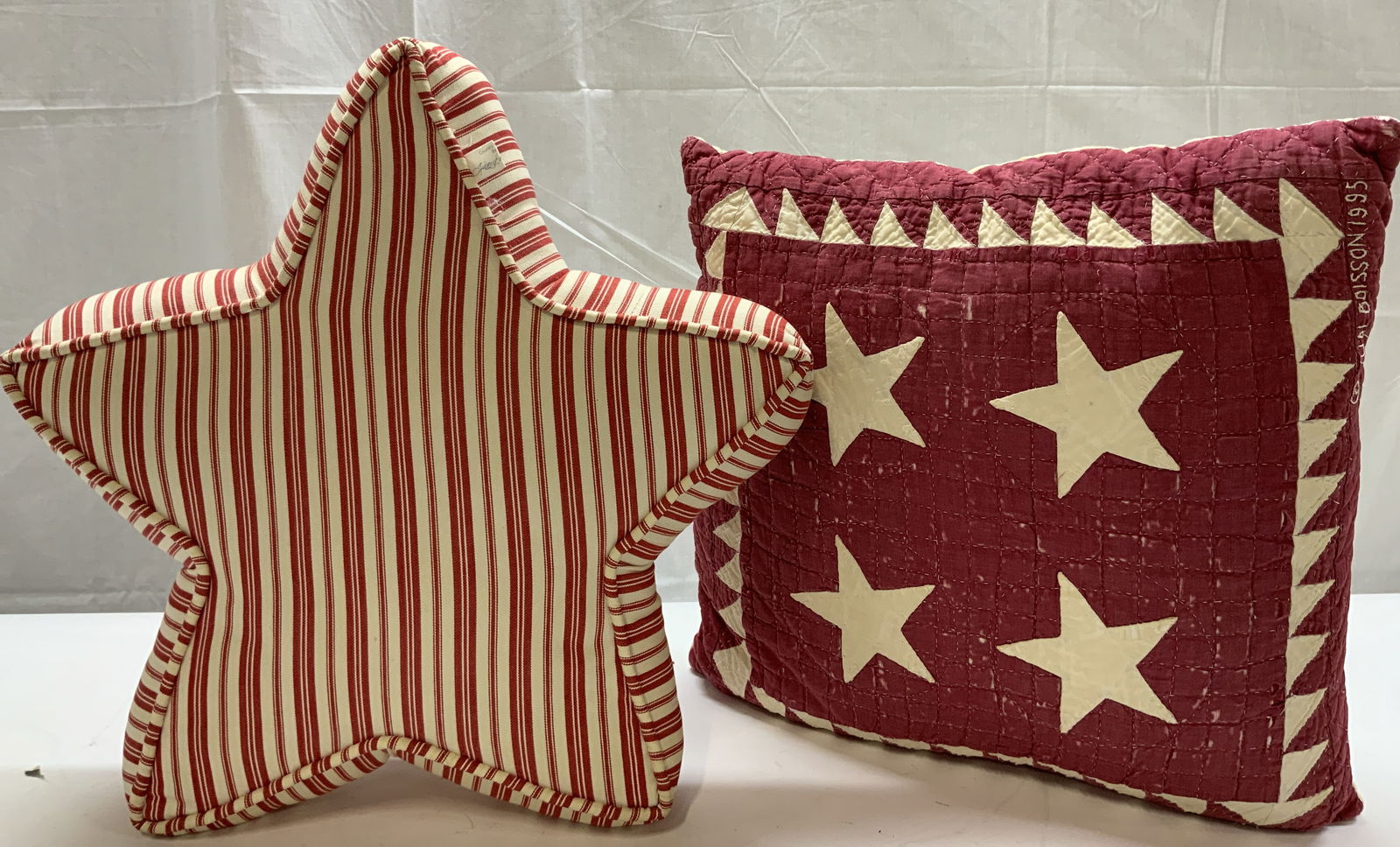 Lot 2 VNTG. Judi Boisson & Star Decorative Pillows: Lot 2 VNTG. Judi Boisson & Star Decorative Pillows. 1 Judi Boisson quilted textile pillow with 4 white stars in the middle. Has Judi Boisson 1995 on the bottom right corner. 100% cotton. Tags reads JU