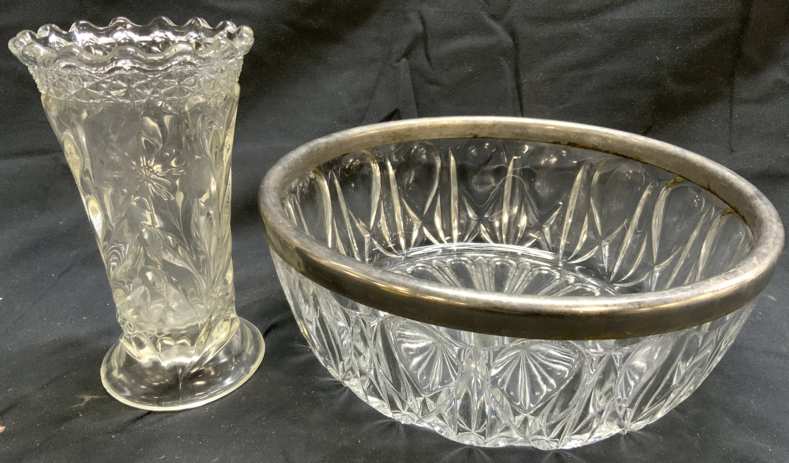 Lot 2 Silver Plate Rim Bowl & Glass Vase: Lot includes 1 glass vase & 1 bowl. Bowl has silver plated rim. Vase has toothed rim. Each vessel appears to be glass. Each have different relief detailing. Bowl measures approximately 9 inches diamet