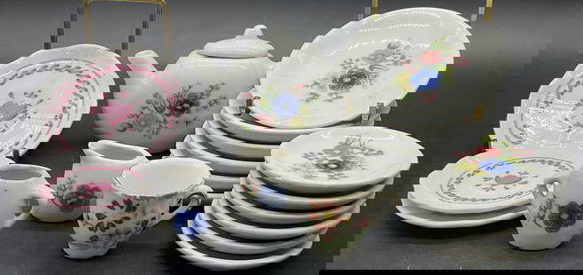 19 Vintage Ceramic Childrens Tea Service, Plates+: A group lot of nineteen pieces of a childrens tea service. Includes heart motif dishes, floral dishes, a floral teacup, a creamer & sugar bowl, and a teapot. Some pieces are marked STROMBECKER CORP. T