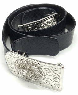 GAY BOYER Blue Snakeskin Style Belt: GAY BOYER Dark Black-Blue Snakeskin Style Belt. The silver tone metal belt buckle is signed GAY BOYER on the reverse. The belt appears to be crafted from a synthetic snakeskin style material. Length m
