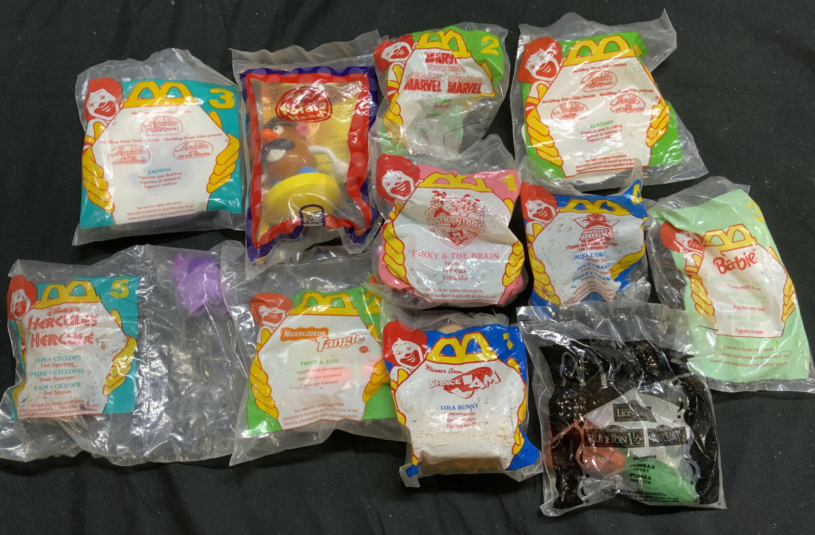 Lot 11+ 1990s McDonalds Happy Meal Toys DISNEY+: Lot 11+ 1990s McDonalds Happy Meal Toys DISNEY+ Assorted lot of vintage McDonalds happy meal toys. Toys are from DISNEY, MARVEL & NICKELODEON. Each toy is sealed & has not been individually examined. 