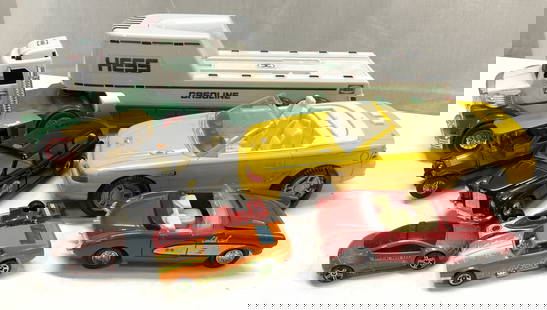 Lot 8+ Vntg Assorted Toy Vehicles MATCHBOX, HESS+: Lot 8+ Vntg Assorted Toy Vehicles MATCHBOX,HESS+ Lot features a variety of toy cars. Including, convertibles, vintage cars, sports cars, Hess truck & more. Signed & marked on underside. Reads MATCHBOX
