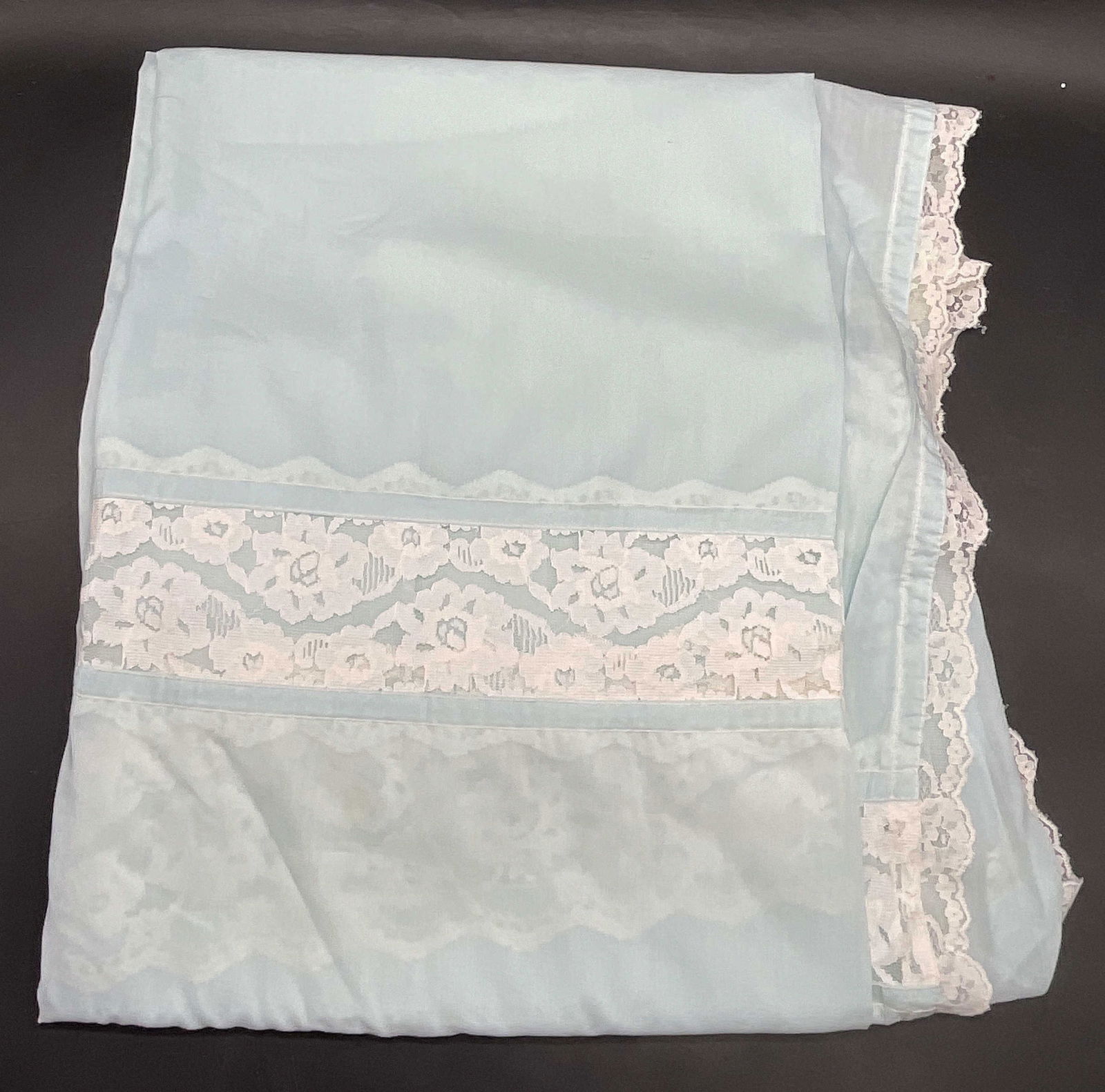 Vintage Blue Fabric Lace Accent Sheet: Vintage Blue Fabric Lace Accent Sheet. Initials to the center. Crafted from soft hand material. Measures approx. 91W x 93L in. Discoloration, holes, and surface wear present. Vintage textile, vintage