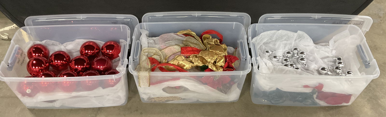 Group Lot 40+ Christmas Holiday Ornament Decor: A group lot of Christmas / Holiday ornament and ribbon decor. Crafted from glass, plastic, glitter, fabric, and other materials. Silver, red, and gold tone hues to the pieces. Discoloration, surface w