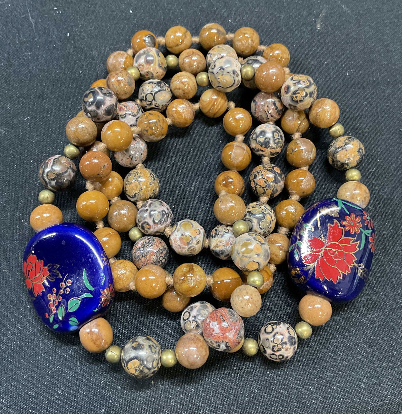 Vintage Gold tone brown Stone Floral Necklace: Vintage beaded necklace. Gold tone, brown stone, and floral beads. Drop length approx 15.5 inches. Some wear including scratching. Jewelry, estate jewelry, costume jewelry, cocktail jewelry, fashion j