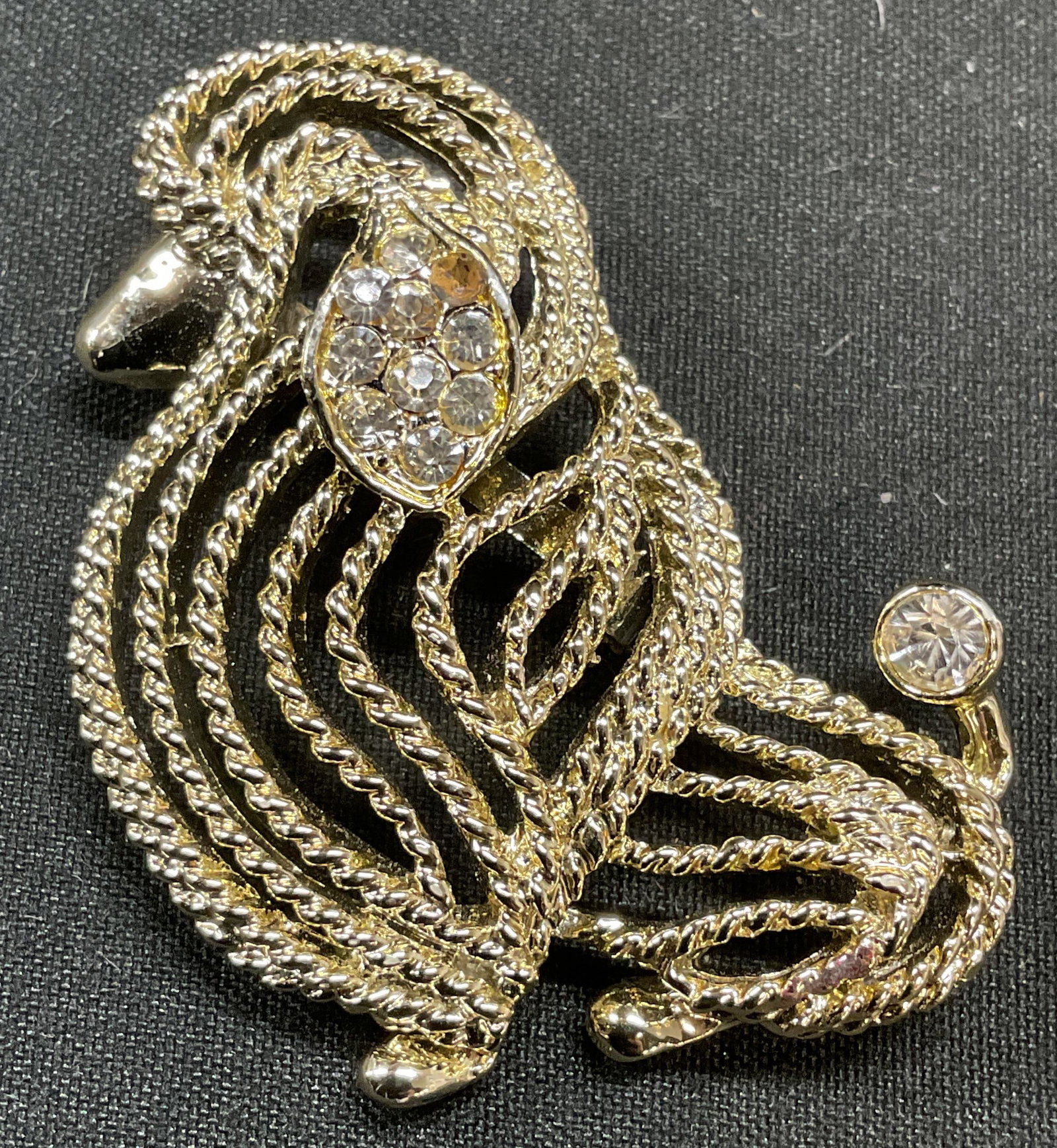 Vtg Gerrys Gold Tone Crystal Poodle Brooch: Vintage Gerrys gold tone crystal poodle motif brooch. Signed. Measures approx 1.5 x 1.5 inches. Some wear including scratching. Some crystals need replacement. Jewelry, estate jewelry, costume jewelry