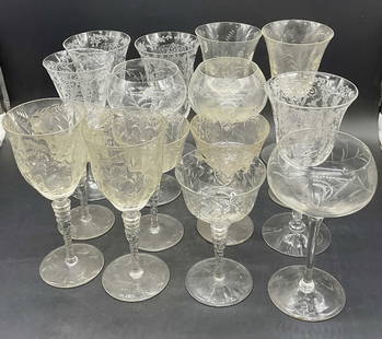 Lot 16 Glass & Crystal Etched Stemware Glasses: Lot of 16 Glass & Crystal Etched Stemware Glasses. Tallest measures approx. 8H x 3.75W in. Discoloration, chipping, and surface wear present. home decor, home accents, homewares, housewares, home acce