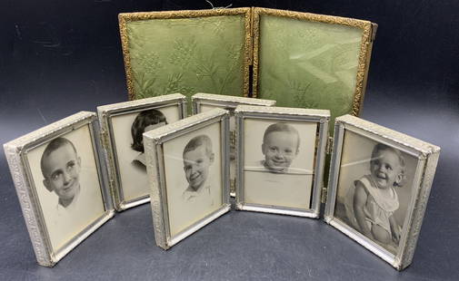 Lot 3 MARSHALL FIELD & CO. + Metal Picture Frames: A lot of three vintage metal picture frames. Two silver tone metal picture frames that can hold three pictures. And, one brass hued metal picture frame that can hold two photos and folds open. The bra