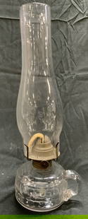 Vintage Oil Hurricane Glass Lamp w Handle: Hurricane glass lamp. Piece is vintage. Base has handle. Knob is trademarked illegibly. Oil art glass lamp. Piece measures approximately 13.5 inches tall 5 inches deep 4 inches wide. Lamp, glass lamp,