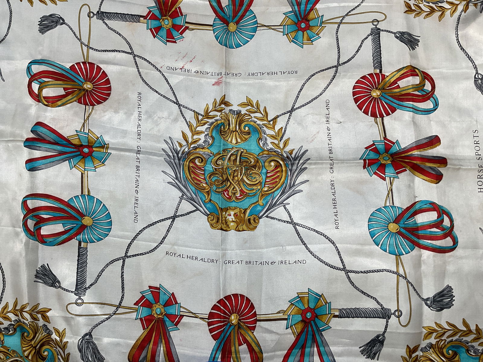 Jean Player Blue White Royal Heraldry Scarf: Jean Player blue and white Royal Heraldry Great Britain and Ireland equestrian print scarf. Feels like silk. Measures approx 35 x 35 inches. Wear including blemishes and pulling. Jean player scarf, ro