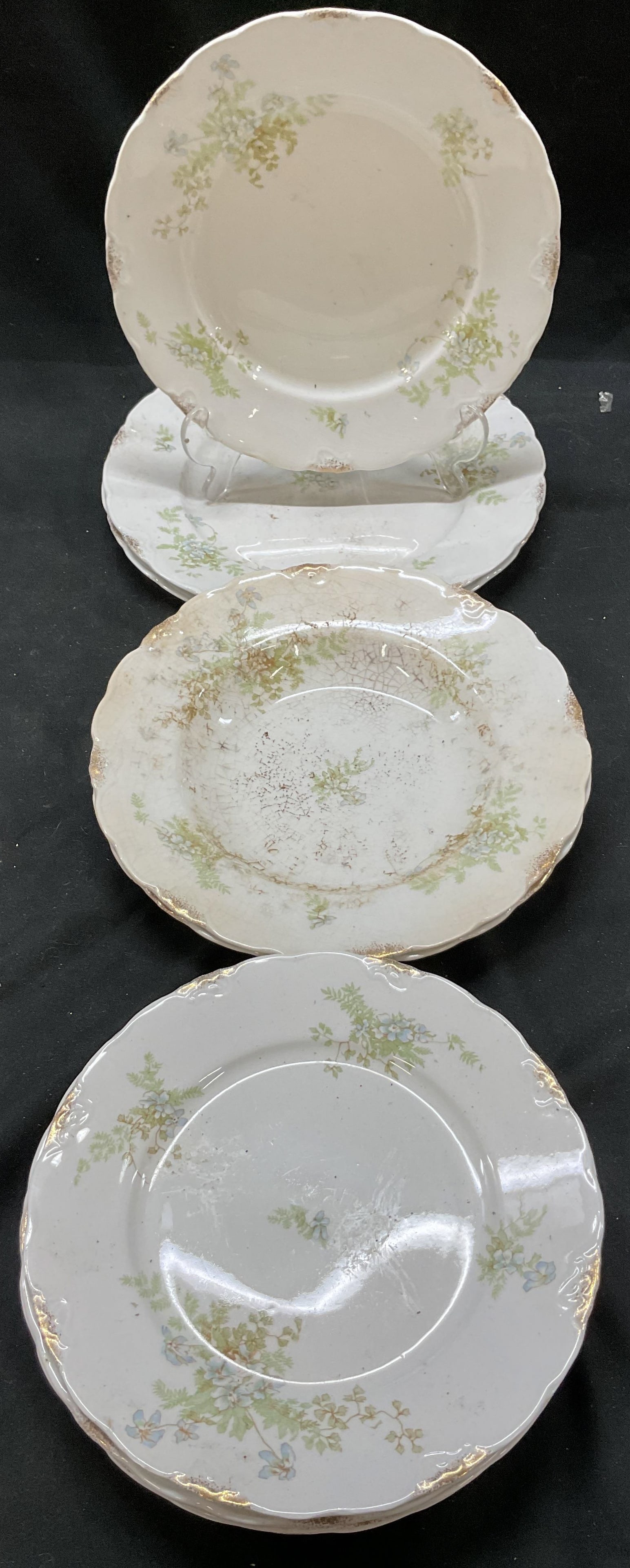 Set 11 J & G Meakin Semi Porcelain Plates, England: Set 11 J & G Meakin semi porcelain plates. Salad plates, lunch plates, dinner plates. Floral pattern design. Hanley. England. Semi porcelain material. Signed on underside. Dinner plates measure 9 inch