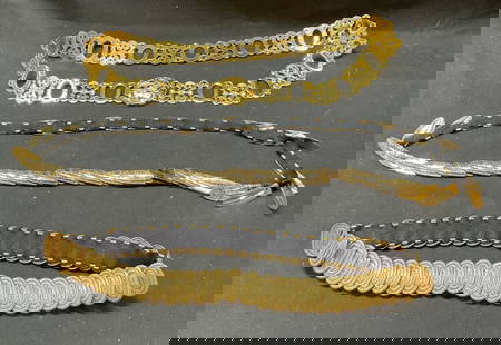 Lot 3 Vtg Gold Tone Metal and Black Elastic Belts: Lot of 3 Vintage Gold Tone Metal & Black elastic belts. Longest Belt length approx. 36 inches. Hook closure. Black material appears to be elastic. Losses, surface wear, and discoloration present. Wear