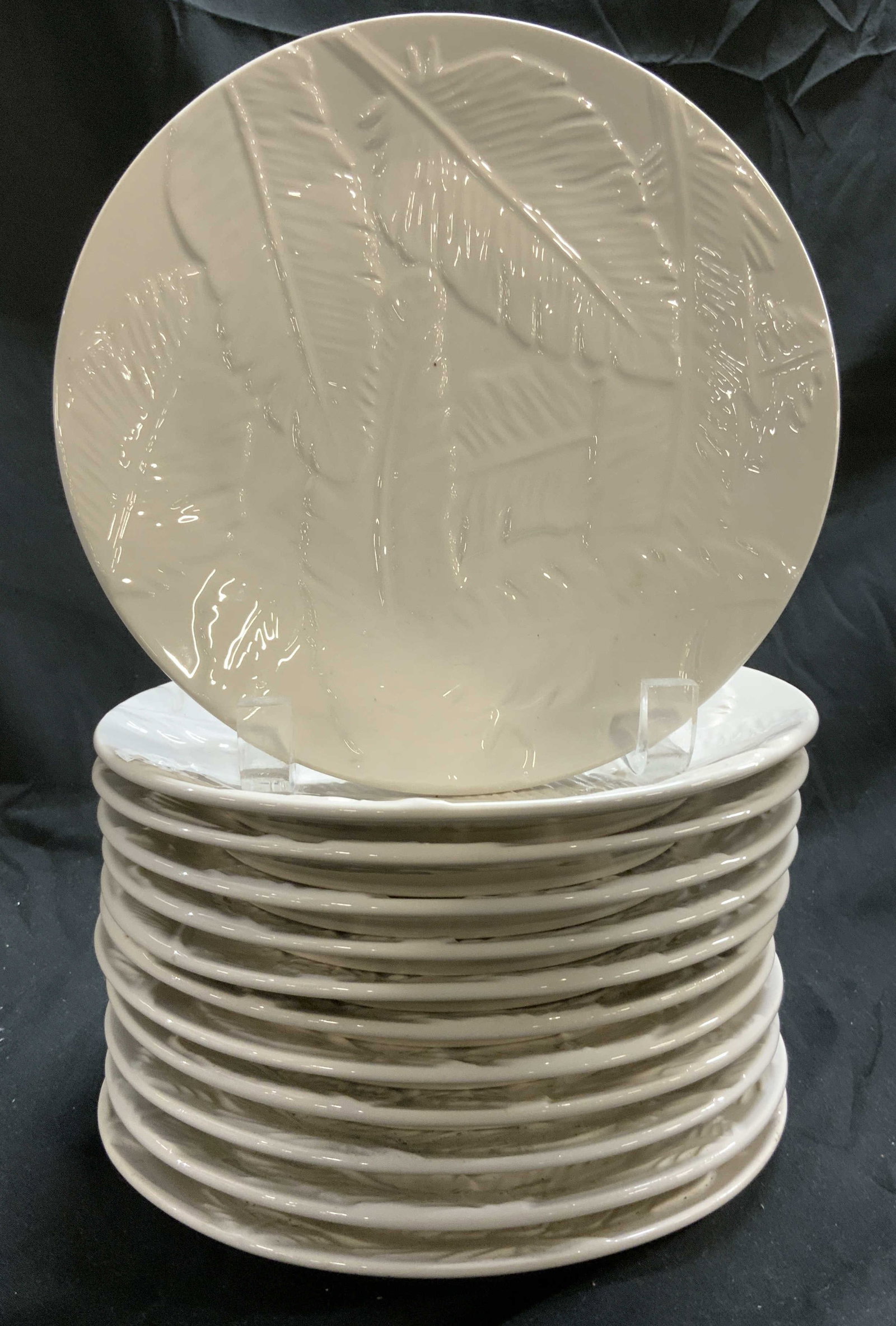 12 PATCH NYC TARGET Feather Ceramic Plates: 12 PATCH NYC TARGET Feather Ceramic Plates Plates feature an embossed feather pattern with an off-cream finish. Underside is signed & marked. Reads PATCH NYC TARGET. Surface wear consistent to age, us