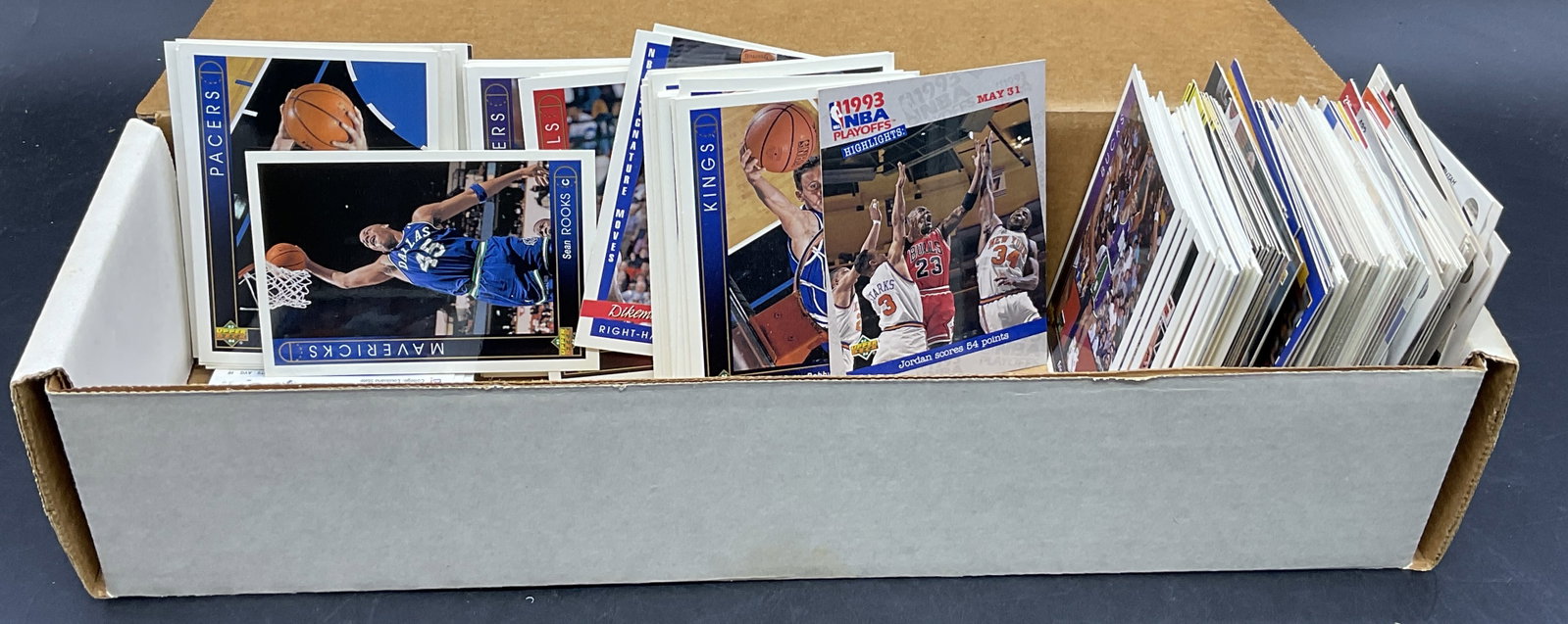 Grp 30+ Vintage Basketball Cards, 1993 Upper Deck+: Group lot of 30+ vintage basketball cards. Primarily 1993 Upper Deck. Includes Kings, Bucks, Pacers, and more. Cards measure approx. 3.5L x 2.5W in. Not examined individually. Surface wear consistent 