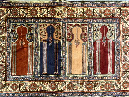 Vtg Turkish H Made Wool Prayer Rug W Fringes: Rug is vintage. Piece appears to be Turkish. Handmade wool prayer rug with intricate multi toned floral, geometric and column detail. Rug has short cream toned fringes at edges. Piece measures approxi
