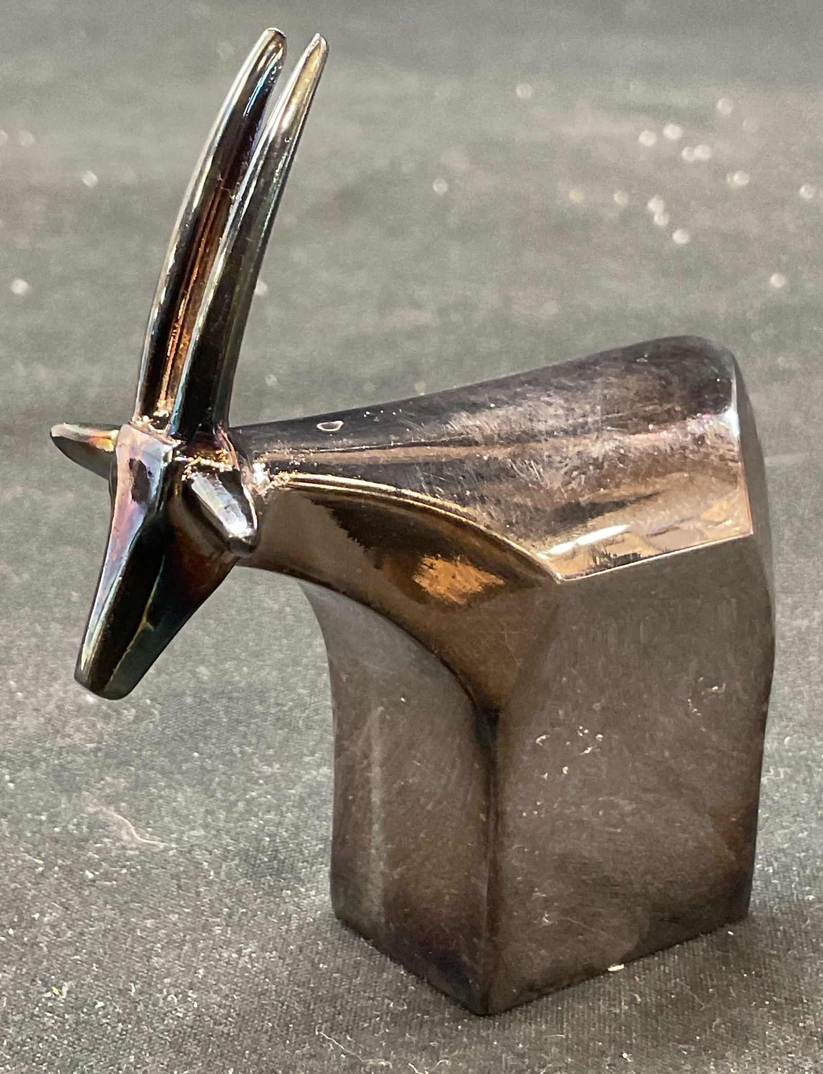 Vtg DANSK Designs Zinc Gazelle Paperweight Japan: Vintage 70s DANSK Designs zinc and silver plated Gazelle Paperweight. Made in Japan. Includes felt bag and marked on underside. 2.75 x 2 x 0.75 inches. Some surface wear consistent with exposure. DANS