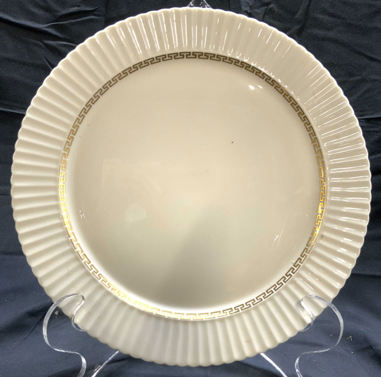 CRETAN BY LENOX Fluted Porcelain Plate USA: Underside is marked CRETAN BY LENOX USA. Plate is cream toned and porcelain with gilt detail near rim. Piece has fluted rim. Plate measures app 12.75 inches diameter. Plate, porcelain plate, Lenox por