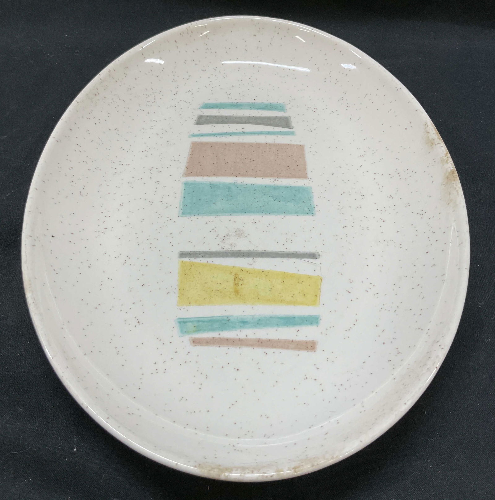 Vtg VERNONWARE Pastel Anytime Oval Platter USA: Vintage VERNONWARE pastels anytime oval platter. Colorful pastel tripled pattern. Brown speckled plate. Signed on underside. Made in USA. 11 x 8 inches. Some surface wear consistent with exposure, som