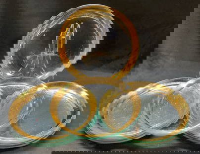 Set 8 Annieglass Gold Plate Clear Thick Glass: Set 8 Annieglass gold plate clear thick glass. Thick clear glass plate with gold rimming. Signed on underside. 8.5 inches. Some surface wear consistent with exposure. Annieglass, gold plate, glass pla